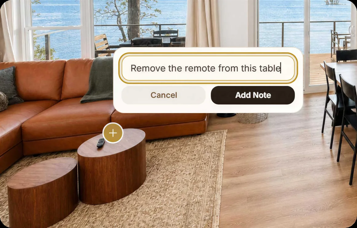 Edit note targeting a remote on a coffee table in a lake-view living room